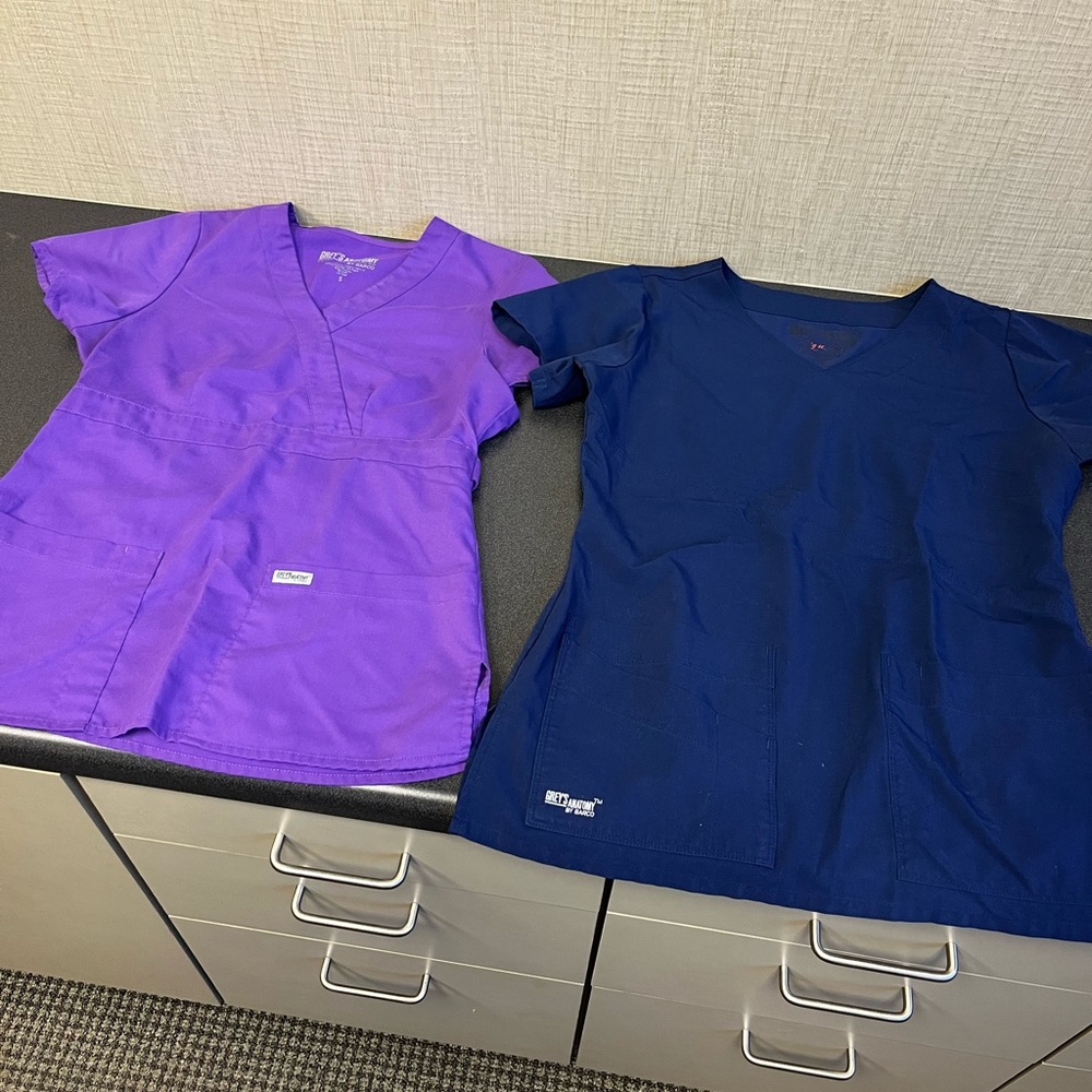 Two Greys Anatomy Scrub Tops. Size small.